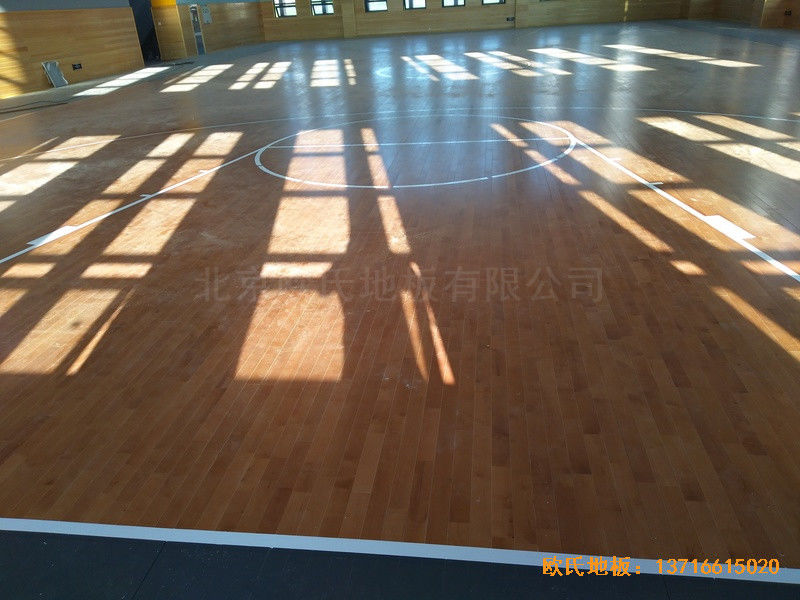 武漢廣阜屯小學(xué)清江錦城分?；@球館運動地板施工案例5